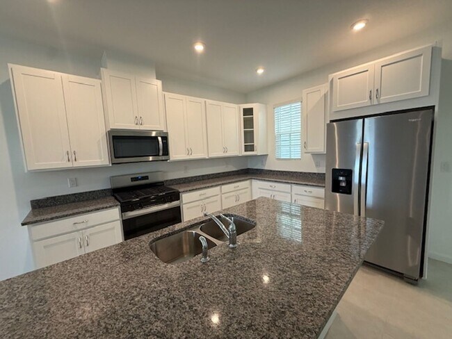 Building Photo - Brand new construction 3 Bedroom Town Home in Island Village of Celebration