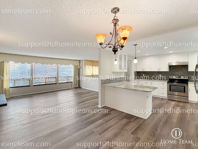 Building Photo - "Spacious 4-Bed Oasis with Granite Touches & Finished Basement in Renton!"