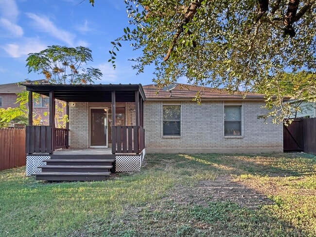 Building Photo - Northeast 3/2 with New Bedroom Floors & Covered Patio