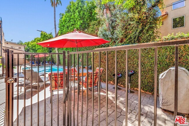 Building Photo - 4477 Woodman Ave