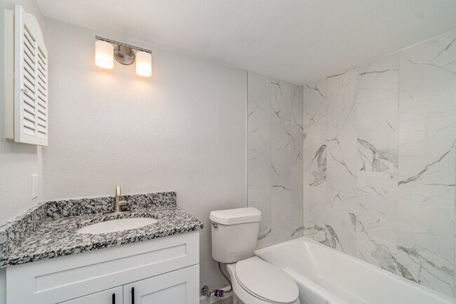 Building Photo - "Chic 2-Bed, 2-Bath Condo with Granite Finishes in Prime Cape Coral Location! 55 and older"