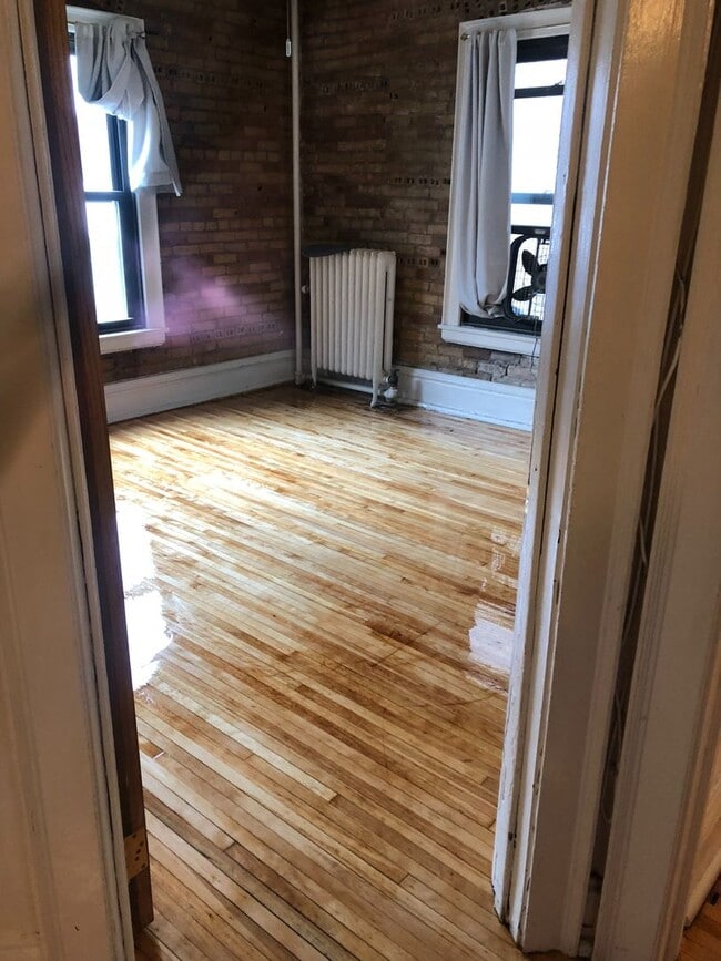 Building Photo - Downtown  2 bedroom Condo across from  St. Thomas close to MCTC, UMN, MCAD . New hardwood floors