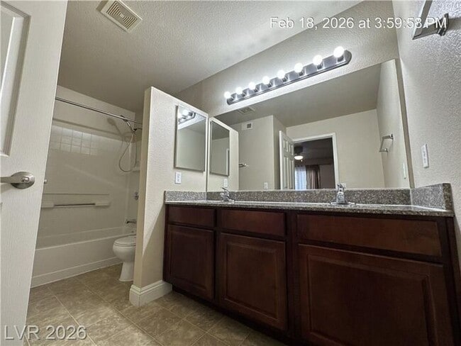 Building Photo - Bright Northwest Second-Floor Condo with Oversized Balcony & Community Pool!