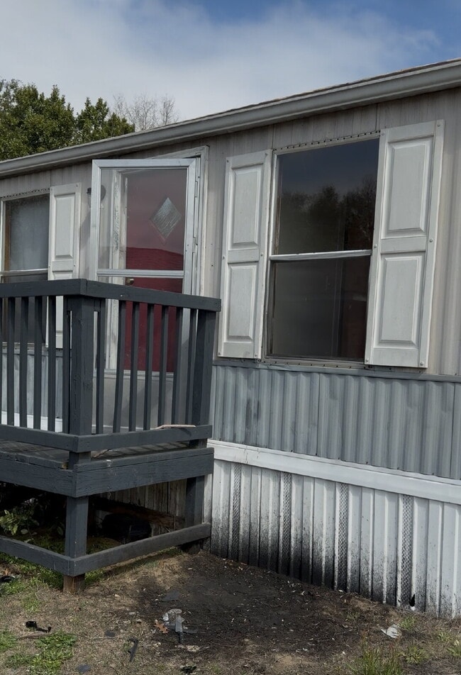 Building Photo - Handyman Special – Land + Home (Rent-to-Own)