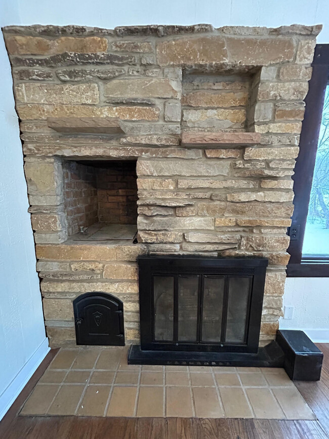 Wood burning fireplace - 11761 N River Rd