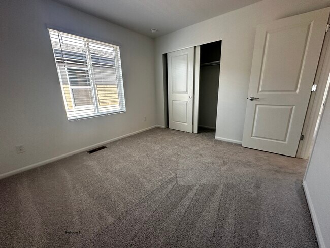 Building Photo - 21154 E 63rd Dr