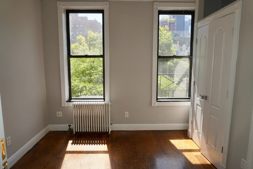 Building Photo - 697 Tenth Ave (47th & 48th Ave), #2FS