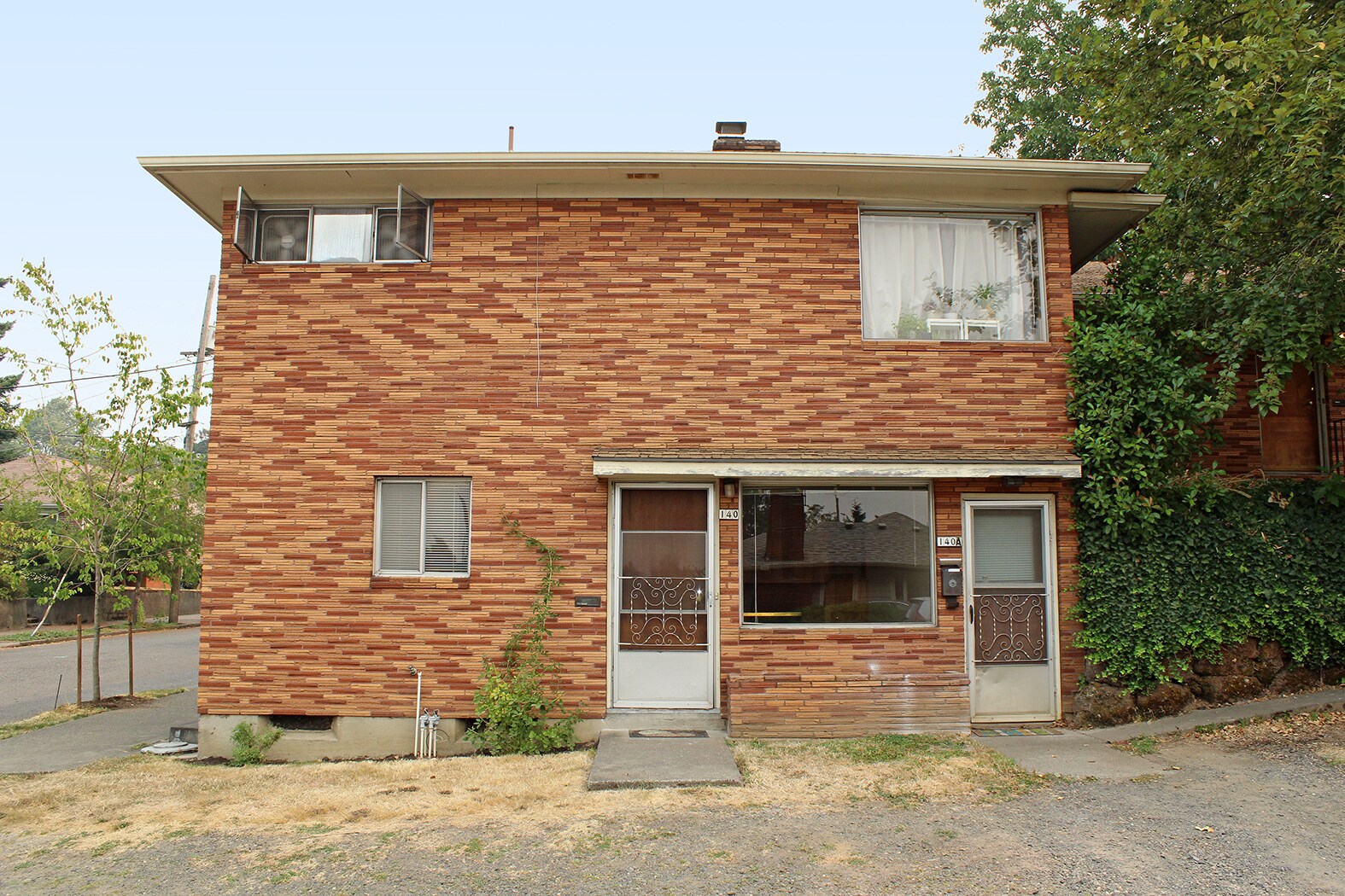 Building Photo - 126-140 NE 59th Avenue