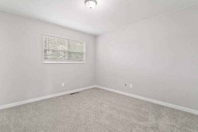 Building Photo - Freshly Renovated 4-Bedroom Home with Over...