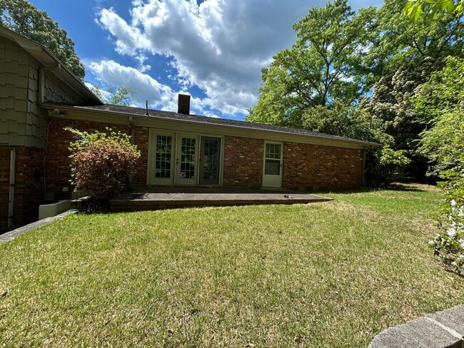 Building Photo - Spacious Multi-Level Brick Home