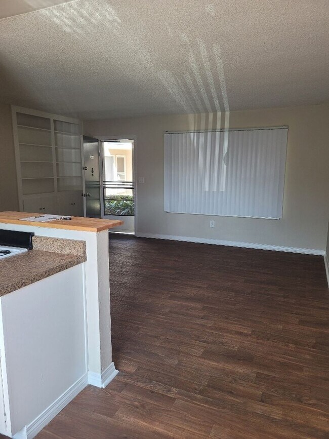 Building Photo - Welcome home to Seabreeze Garden Apartments