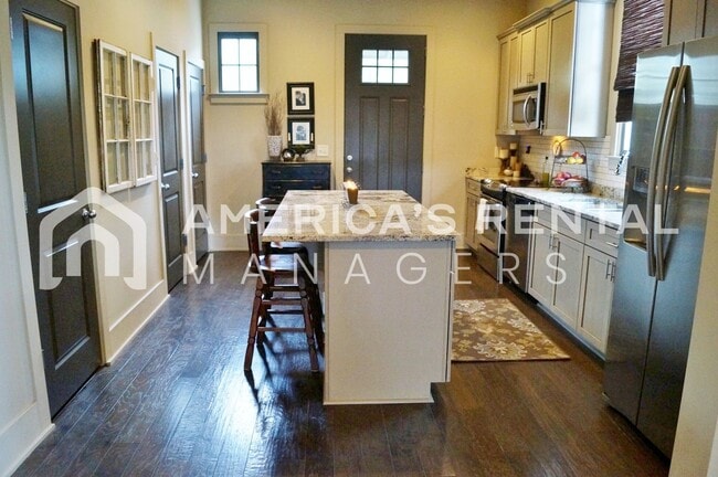 Building Photo - DEPOSIT PENDING! Beautiful Loft Style Town...