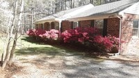 Building Photo - 3 Bedroom 2 bath Brick Ranch on 7.9 Acres ...