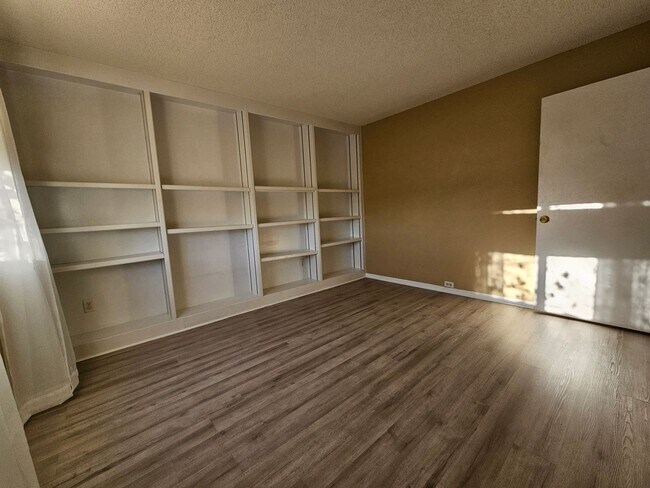 Building Photo - Charming House 3 Beds 2 1/2 Baths 2 Living Areas- Backs To Open Space