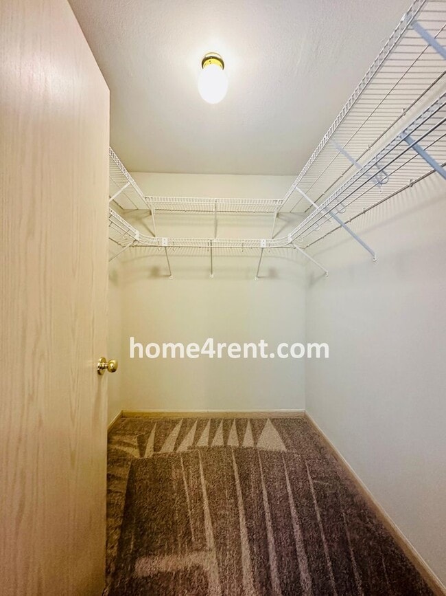 Building Photo - Maintenance FREE, Ranch Style Townhome w/ ...