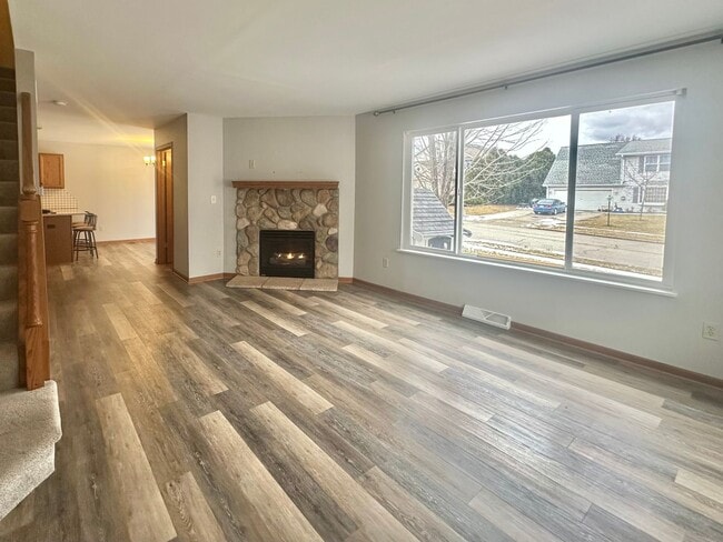 Building Photo - Charming Pewaukee Townhome with Modern Touches and Ample Space