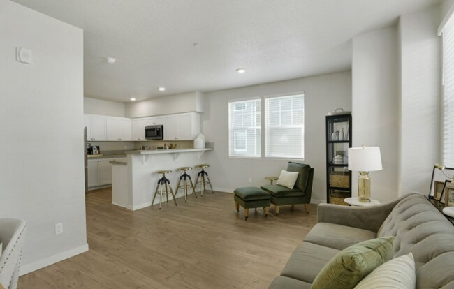 Building Photo - Modern Ground-Level Condo in River Terrace...
