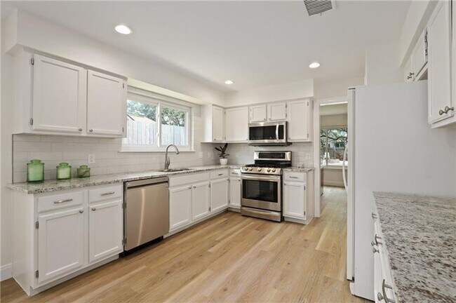 Building Photo - 4-bedroom, 1-story home with dedicated office space and large backyard!