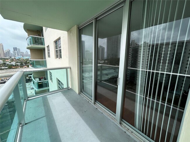 Building Photo - 19390 Collins Ave