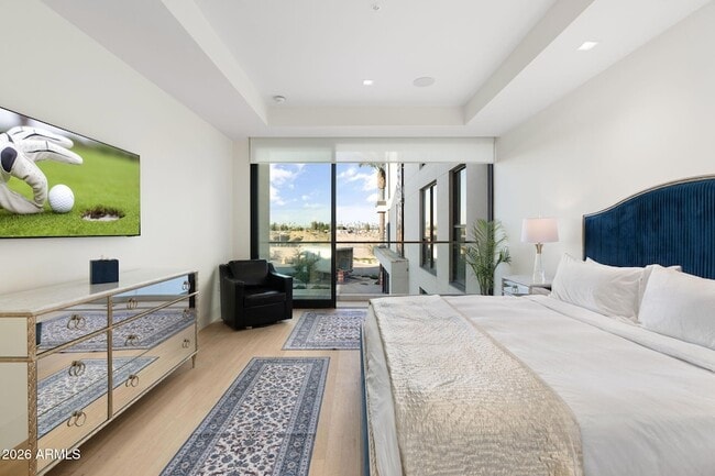 Building Photo - 6587 N Palmeraie Blvd