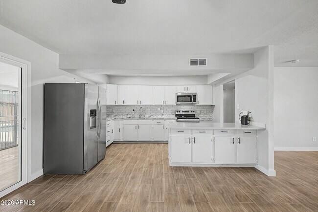 Building Photo - 6536 W Turney Ave