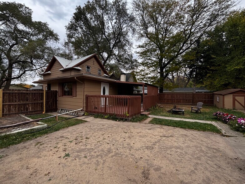 Back of home with deck - 829 W 5th Ave