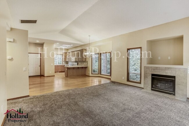 Building Photo - Serene 4-Bed Home with Huge Common Room & Deck!