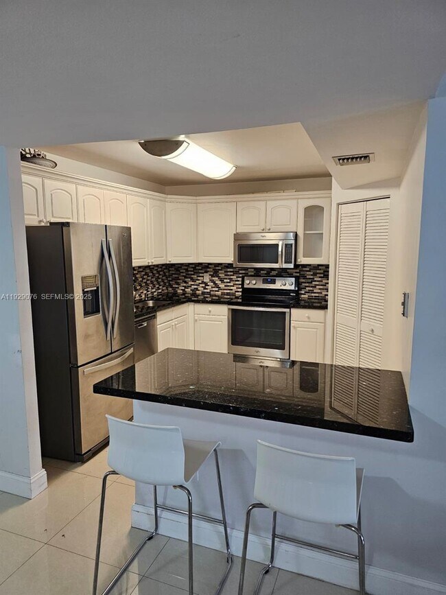 Building Photo - 9273 Collins Ave