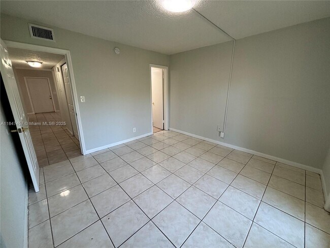 Building Photo - 7921 NW 44th Ct