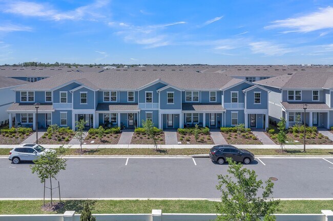 Building Photo - Luxurious Townhome in Lake Nona - A Perfec...
