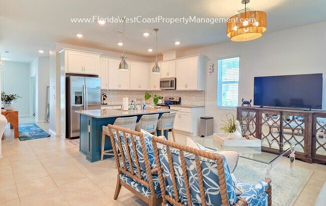 Building Photo - EXCEPTIONAL AND SPACIOUS FURNISHED TOWNHOME WITHIN WATERSIDE- NAUTIQUE!