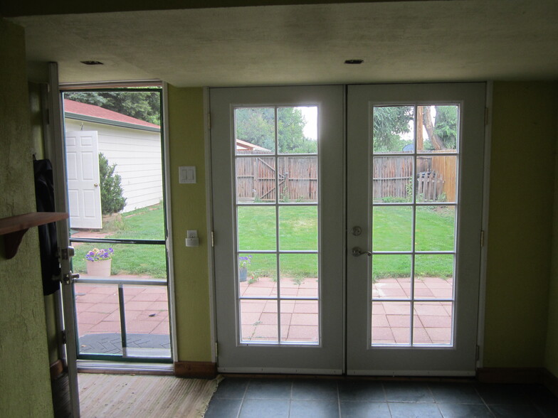 French doors from the dining room to the backyard - 7605 Robinson Way