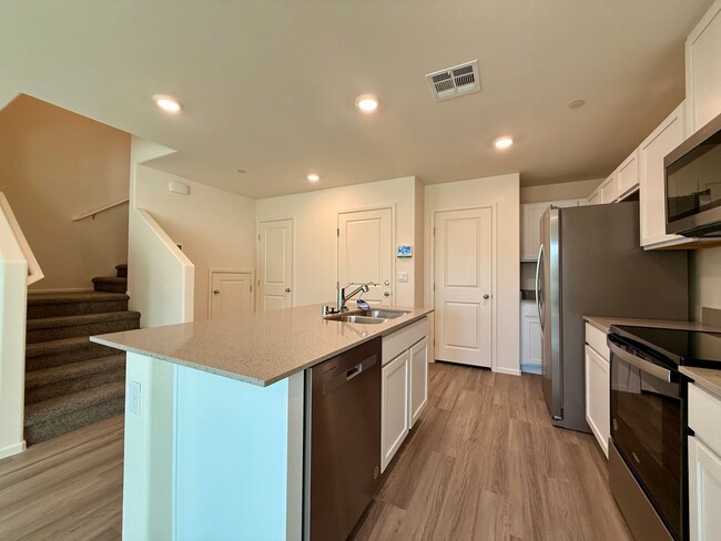 Building Photo - Brand-New Townhome for Rent in the Highly ...