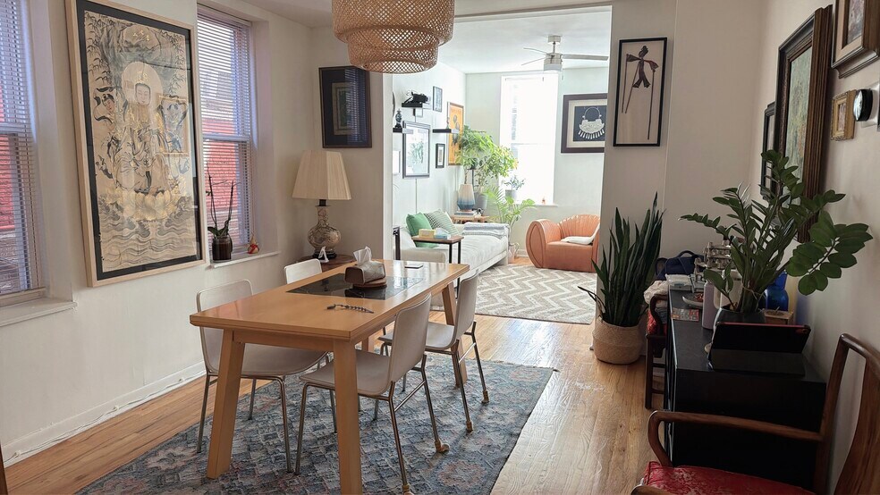 South-Facing Living Room with Abundant Natural Light - 1032 W 31st Pl