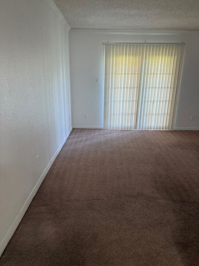 Building Photo - Ground Floor Two bedroom condo