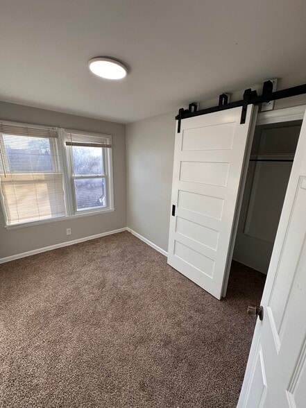 guest room barn door closet - 4308 Francis St