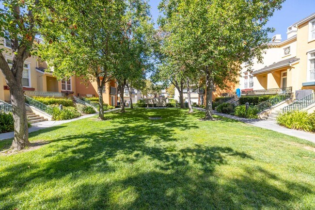 Building Photo - Spacious End-Unit Townhome in Gated Liberty Commons