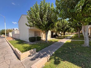 Building Photo - Desirable End-Unit Townhome with 2-Car Garage & Private Courtyard