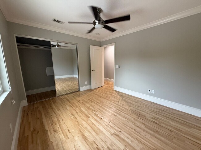 Building Photo - MOVE IN READY 2/2 with 2 Assigned Parking! In Unit Washer & Dryer! Gated Community! Centrally Loc...