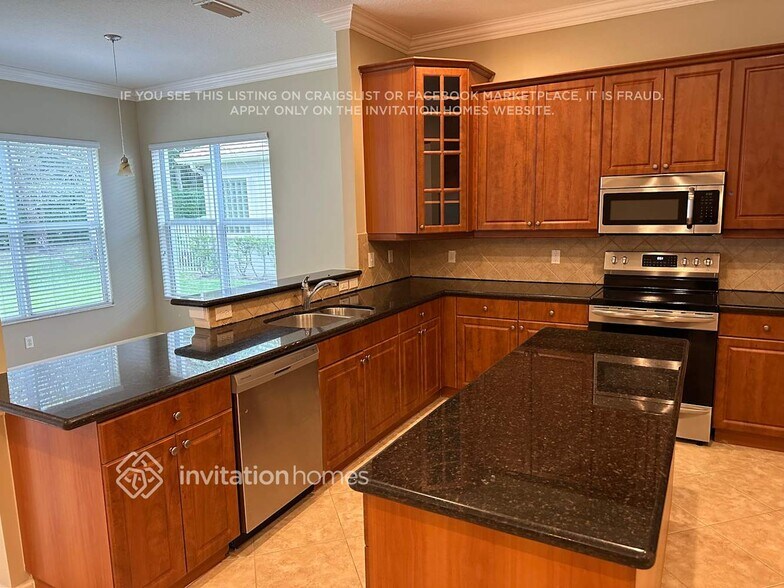 Building Photo - 9343 Plantation Estates Dr