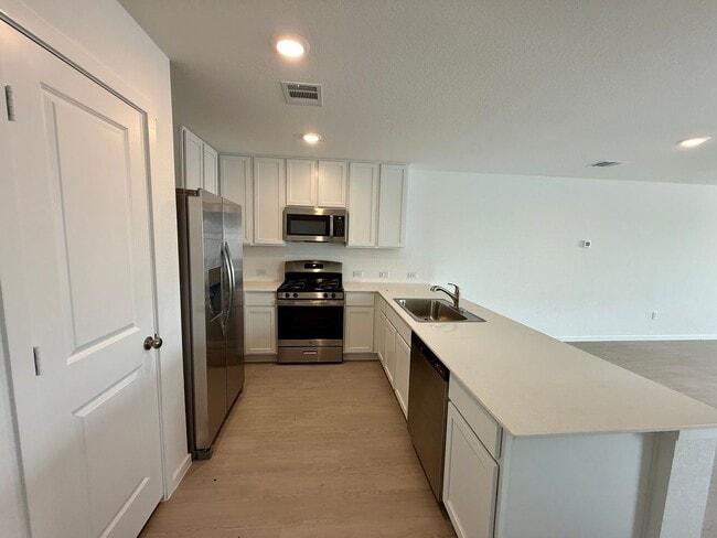 Building Photo - Brand NEW 4-bedroom, 2-bathroom home for l...