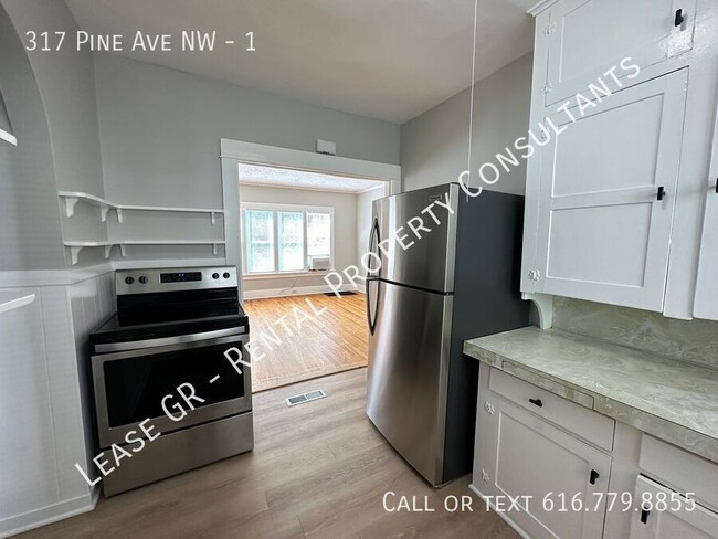 Building Photo - Updated lower 2 bedroom on the West side o...