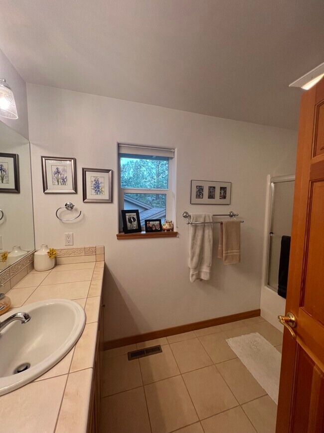 upstairs bathroom - 60709 Golf Village Loop