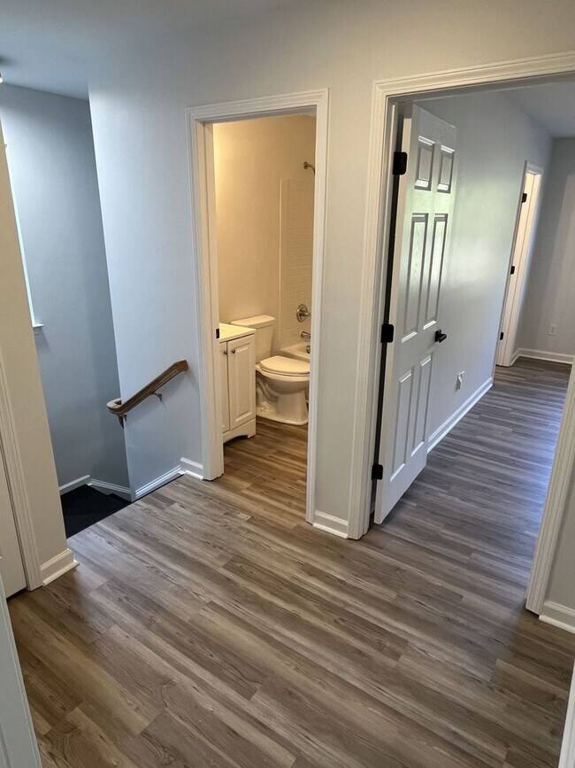 Building Photo - Refreshed 3 Bedroom End Unit Townhome near...
