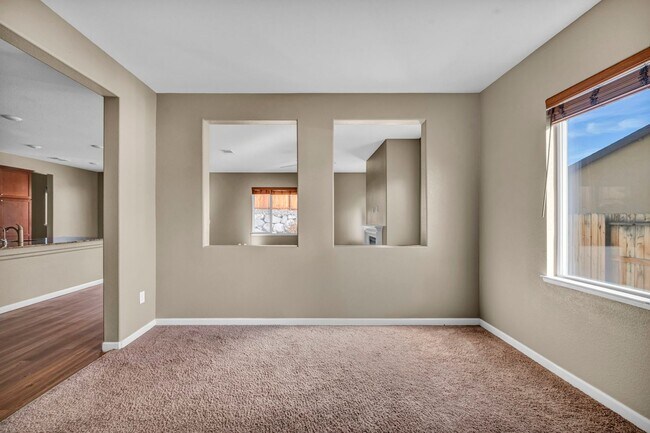 Building Photo - Sun-Filled, Spacious Living with a Three-Car Garage