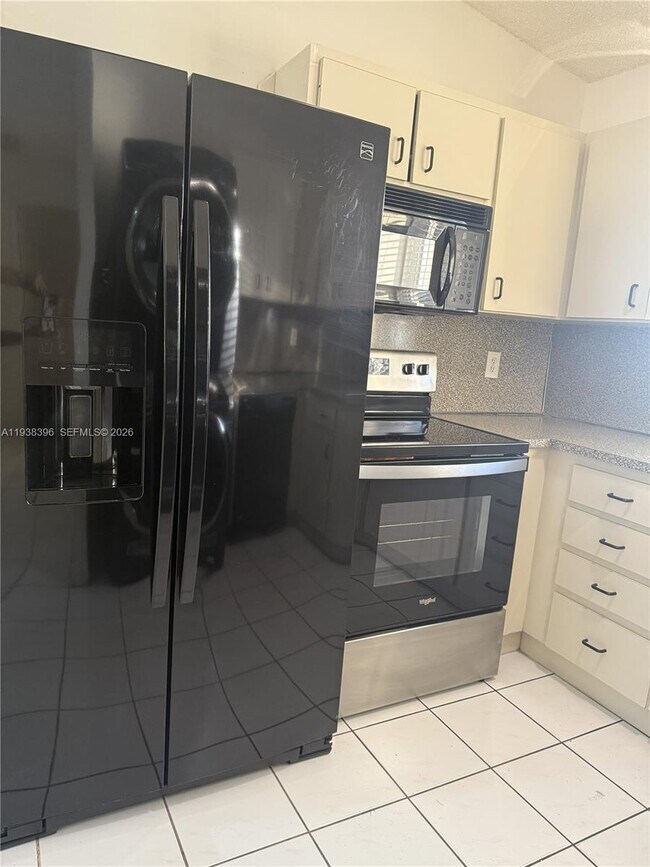 Building Photo - 10101 W Okeechobee Rd