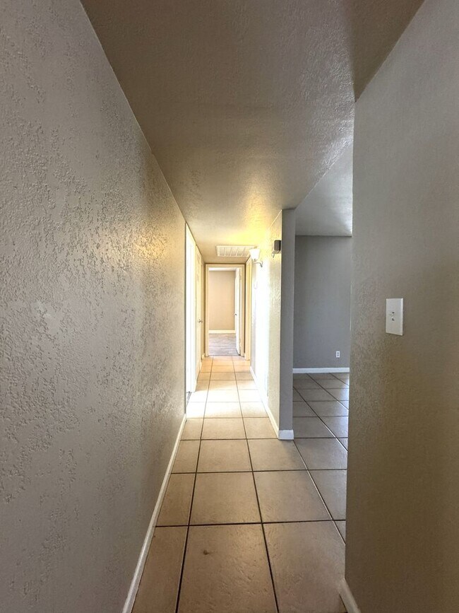 Building Photo - CORNER LOT 3 BEDROOM PLUS DEN WITH FIREPLACE AND LARGE YARD