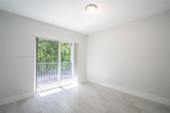 Building Photo - 465 NE 59th St