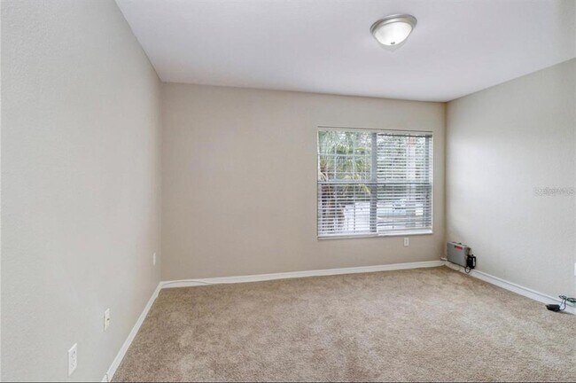 Building Photo - 9506 Lake Chase Island Way