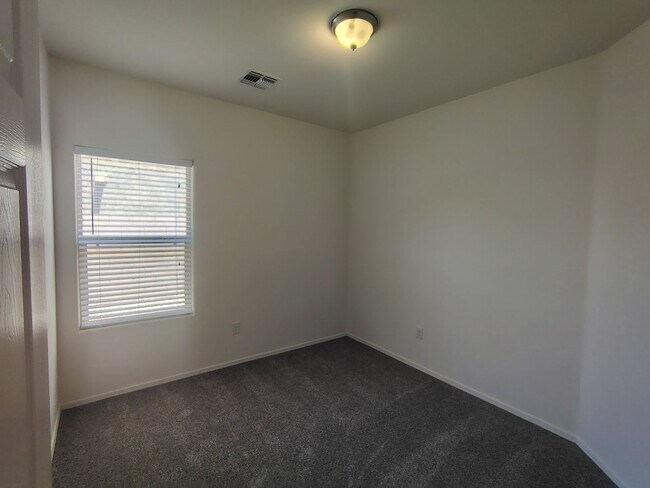 Building Photo - 8990 W Cloudwood Dr